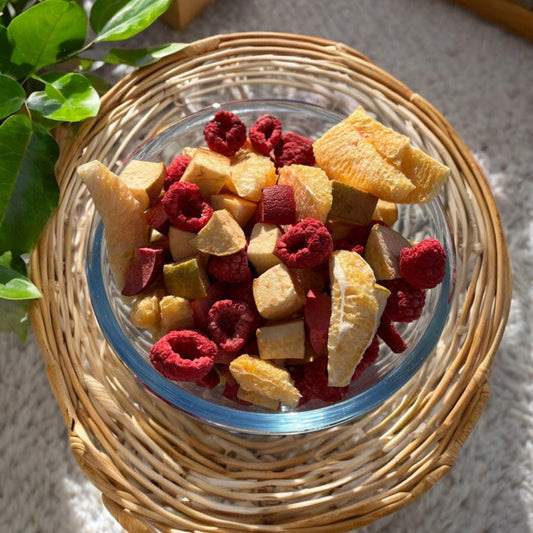 Close-up of Tasmanian freeze dried fruit pieces showing colorful apple, raspberry, strawberry, blackberry and orange mix