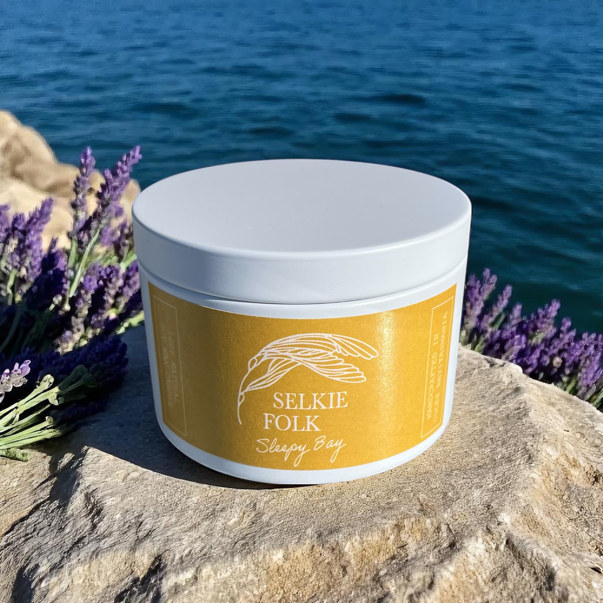 Handcrafted Sleepy Bay soy candle with Selkie Folk branding and Tasmanian coastal-inspired packaging