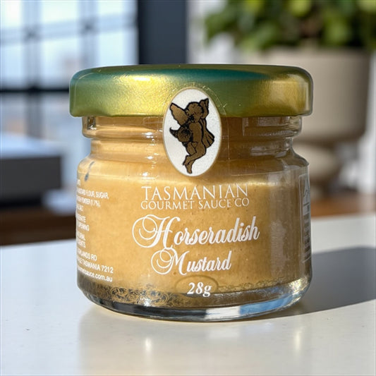 A jar of Tasmanian Gourmet Horseradish Mustard in a kitchen at home.