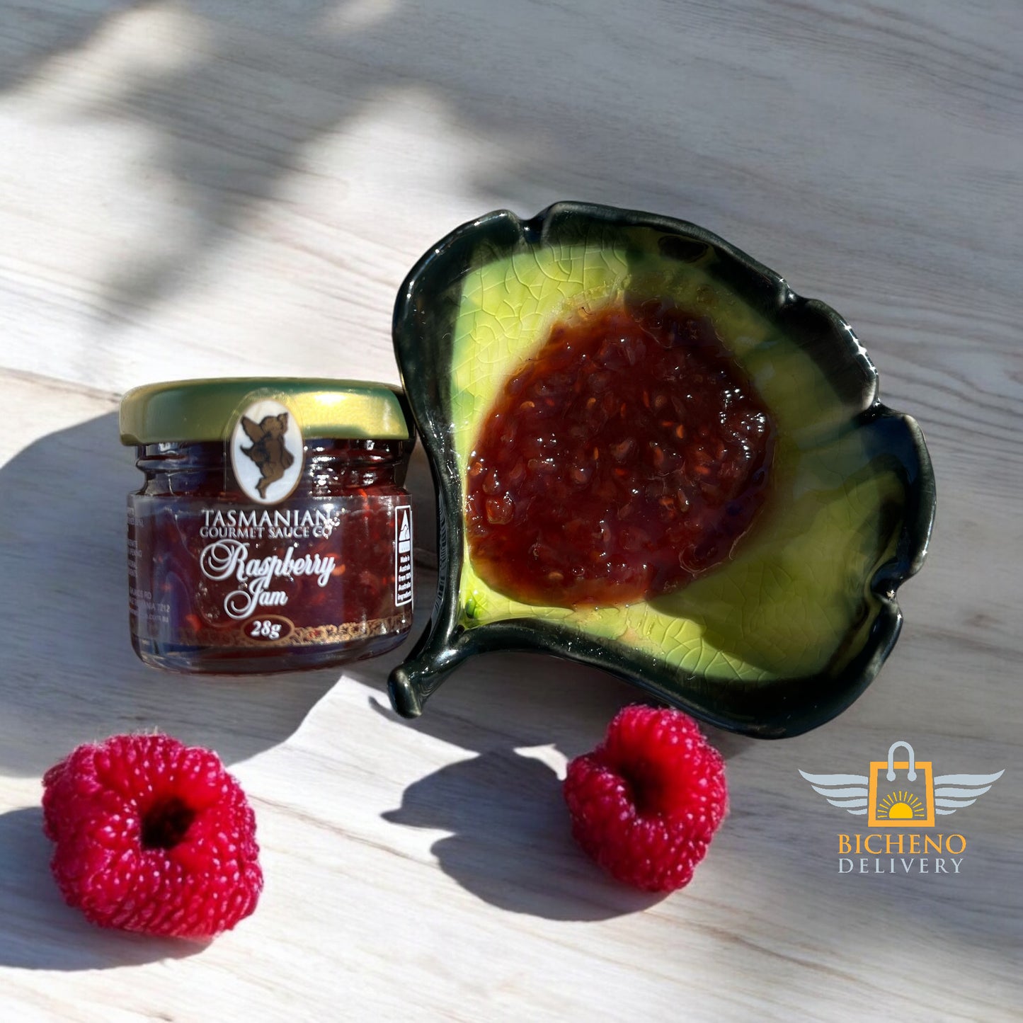 Close-up of award-winning Tasmanian Raspberry Jam texture showing vibrant colour and natural fruit consistency