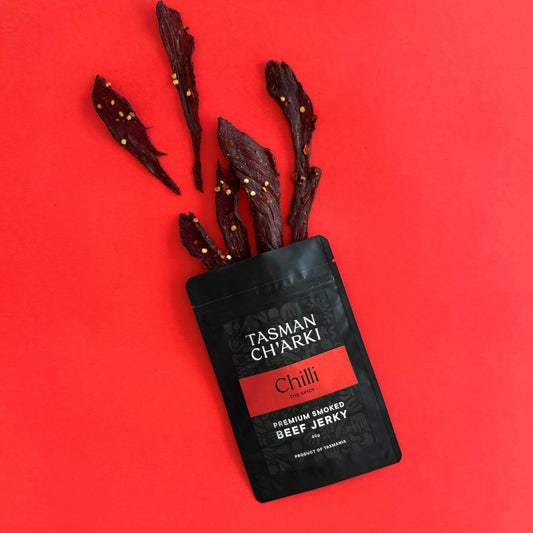 Spicy chilli beef jerky pieces displaying texture and colour of Tasmanian smoked jerky