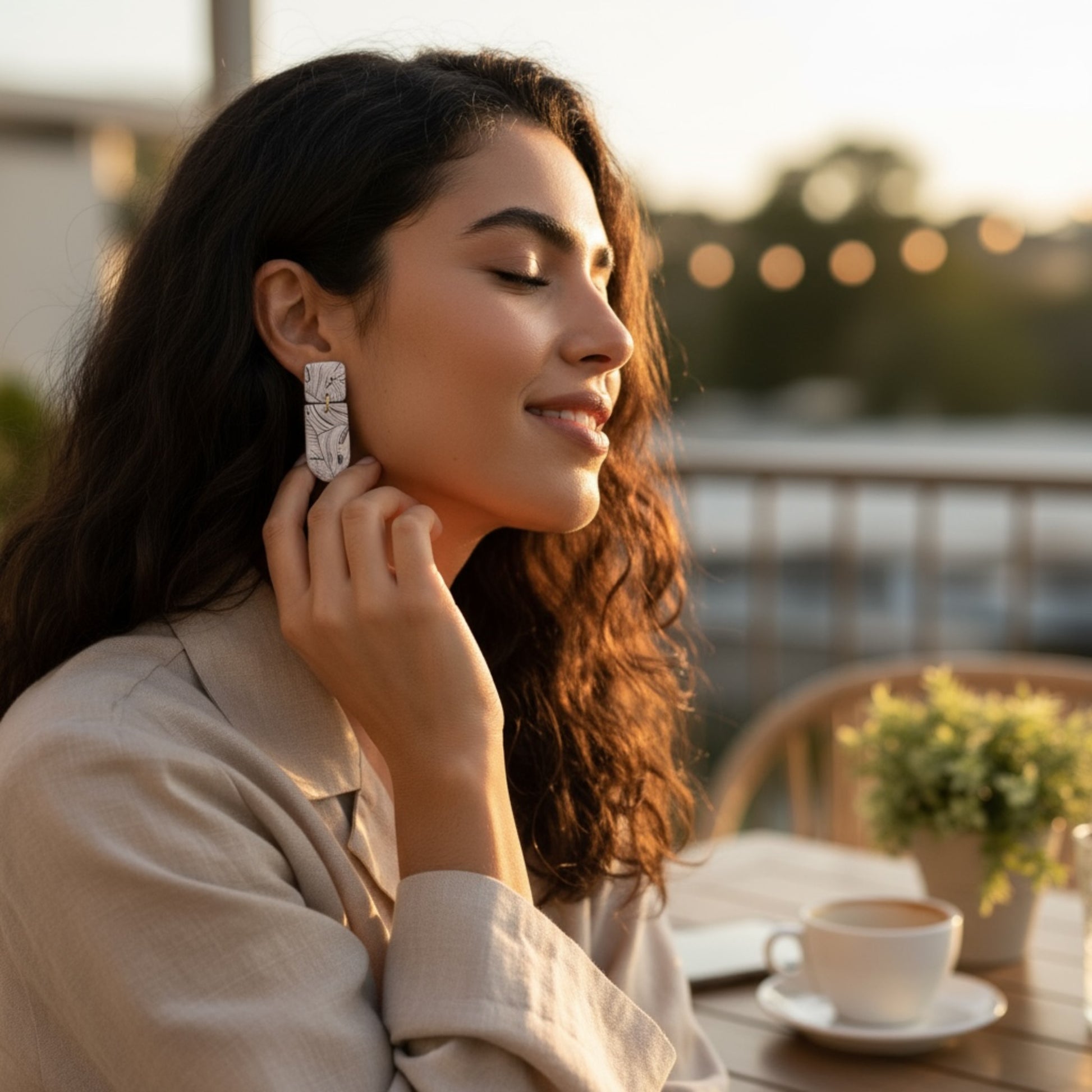 Woman wearing Lana drop dangle earrings by MarvLee Designs Tasmanian jewellery