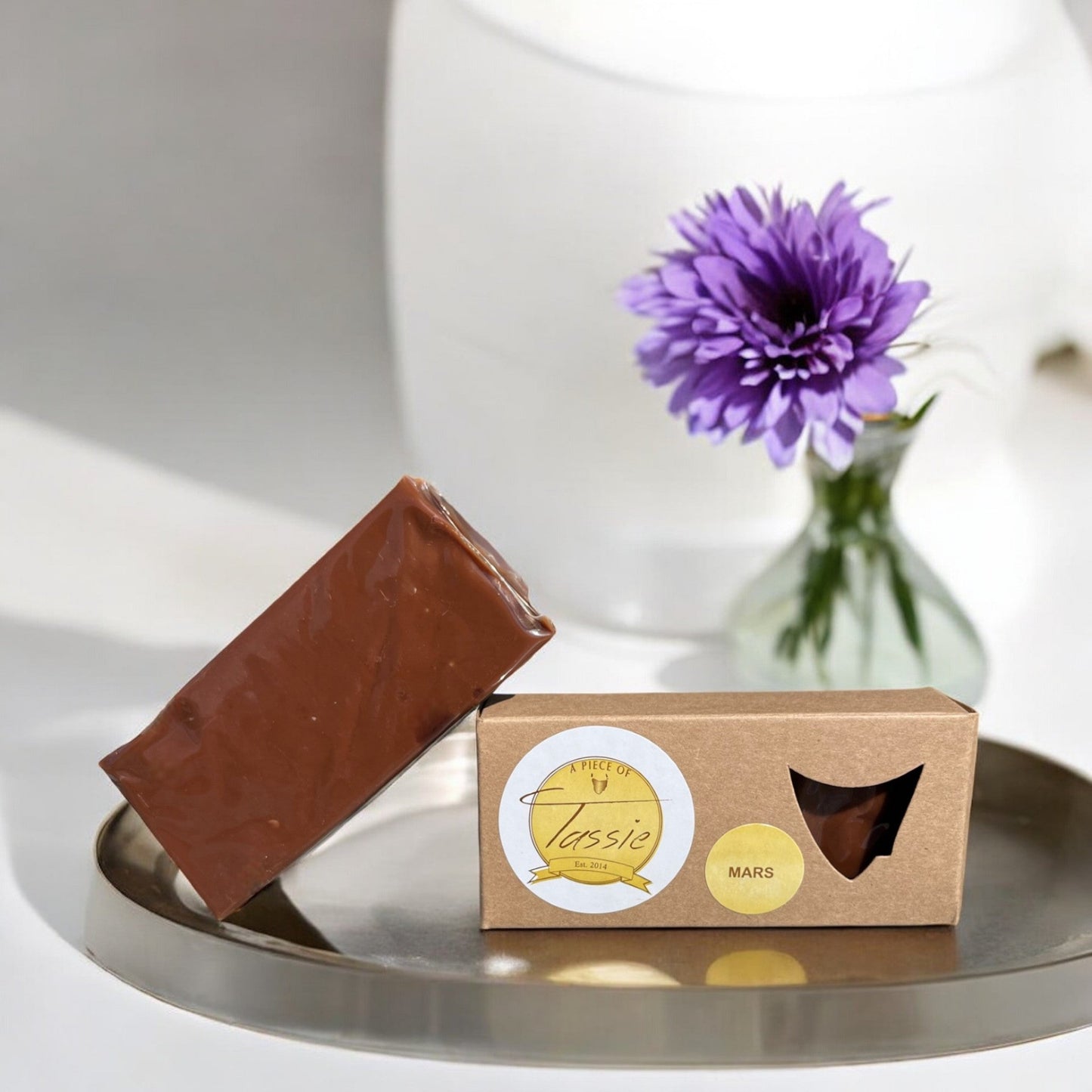 A Piece of Tassie Mars caramel fudge packaging with premium Tasmanian branding