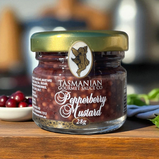 A jar of Tasmanian Pepperberry Gourmet Sauce Co. Mustard with a label displaying the product name and weight.