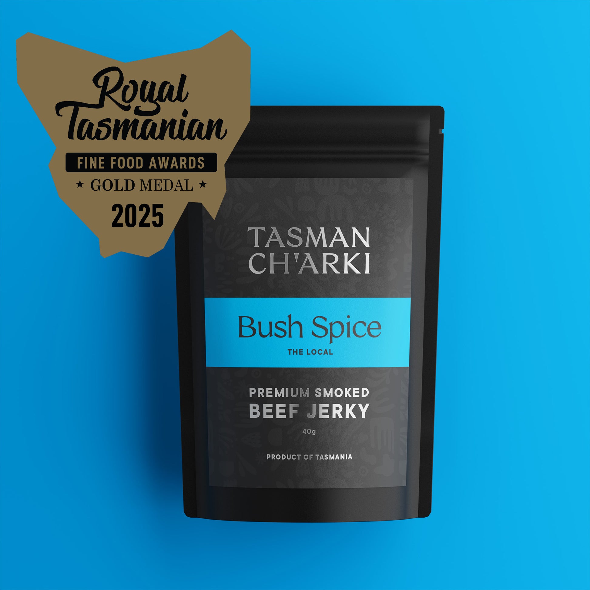 Tasmanian Tasman Ch'arki Bush Spice beef jerky package with a gold medal award on a blue background