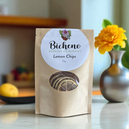 Bicheno Berries and Blooms Tasmanian lemon chips packaging on a kitchen counter with a yellow flower in the background.