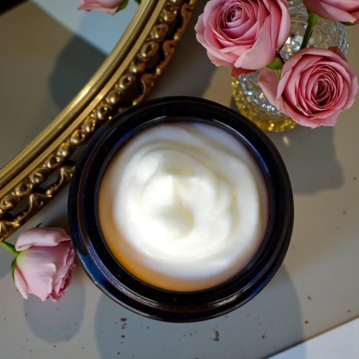 Close-up of  Tasmanian Valley Tallow Rose Tallow Face Cream showing rich, luxurious texture infused with rose