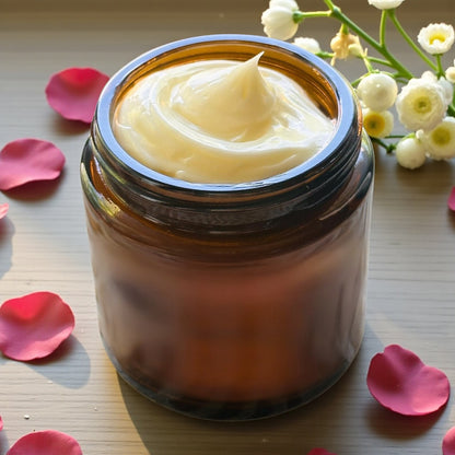 Valley Tallow Summa Luvin Tasmanian Tallow face cream open jar showing rich tallow texture with rose petals and white flowers