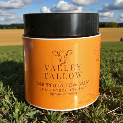 Valley Tallow whipped Tasmanian tallow balm jar on a grassy field background