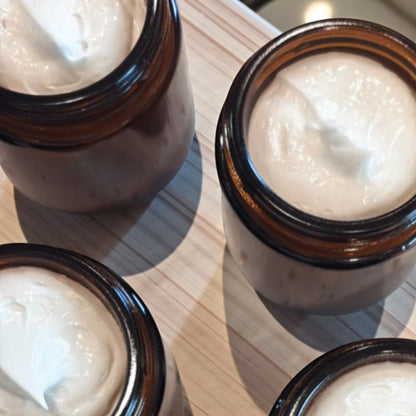Close-up of Valley Tallow unscented magnesium Tasmanian tallow cream showing smooth, rich lotion texture in amber glass jar