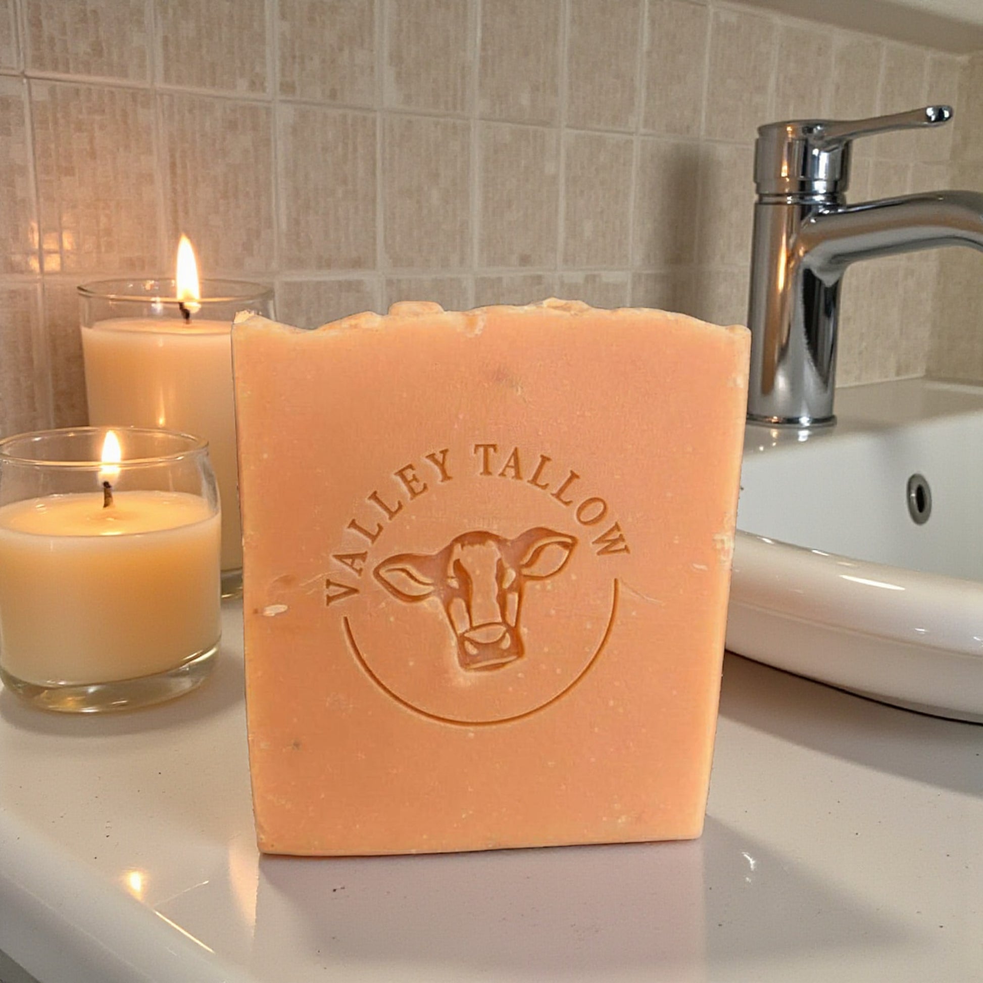 Tassie Tallow - Tasmanian Tallow Soap Blackcurrant and Rose by Valley Tallow on bathroom counter with candles
